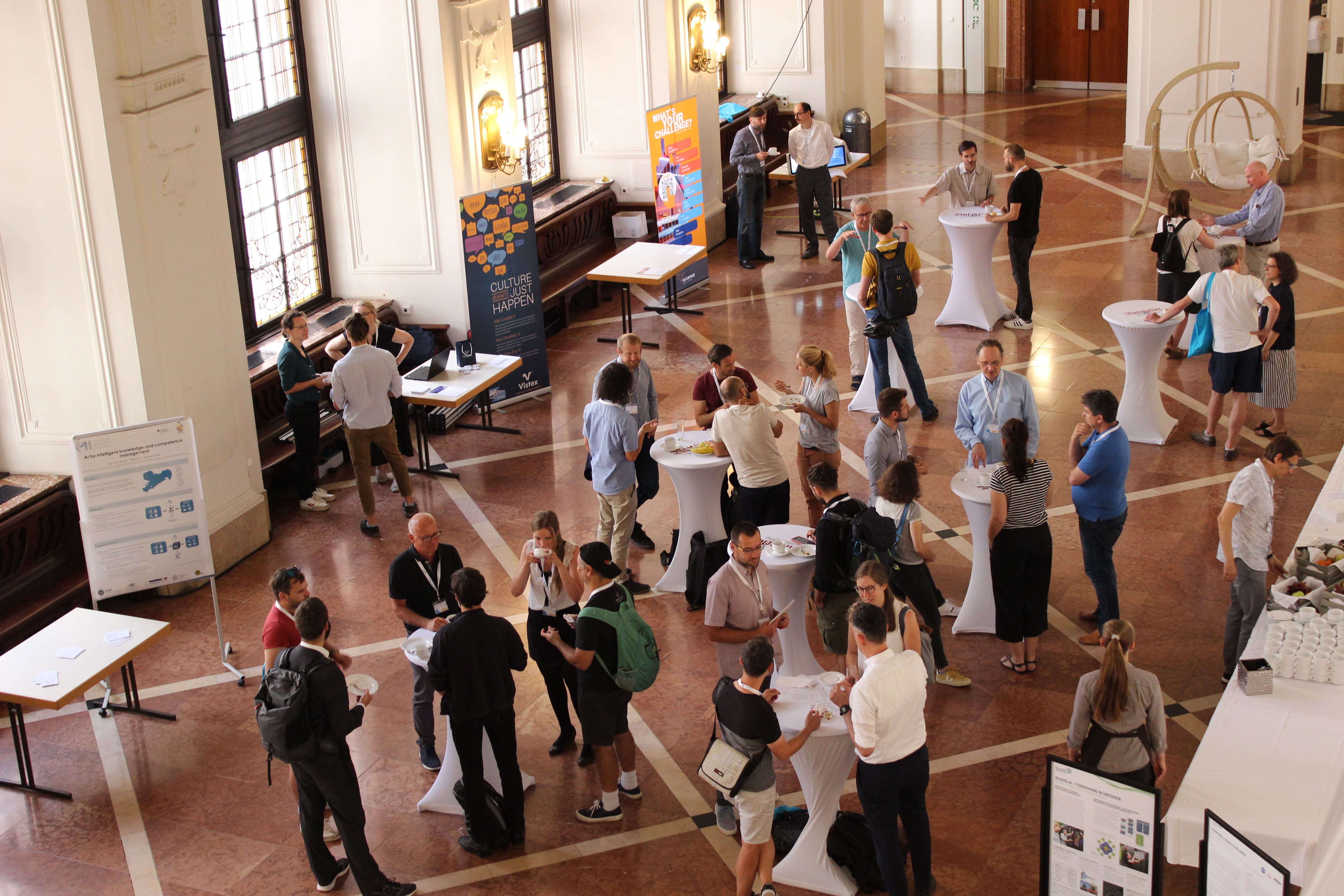 Overview of Wandelhalle and visitors during a coffee break